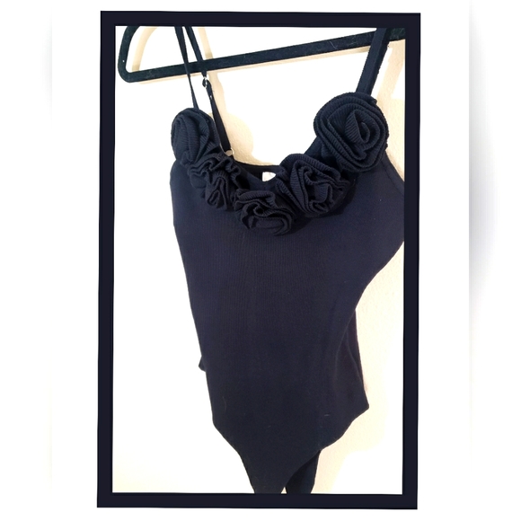 L/C Tops - Nwt flowered bodysuit...various sizes